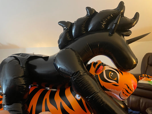 Black unicorn riding vid